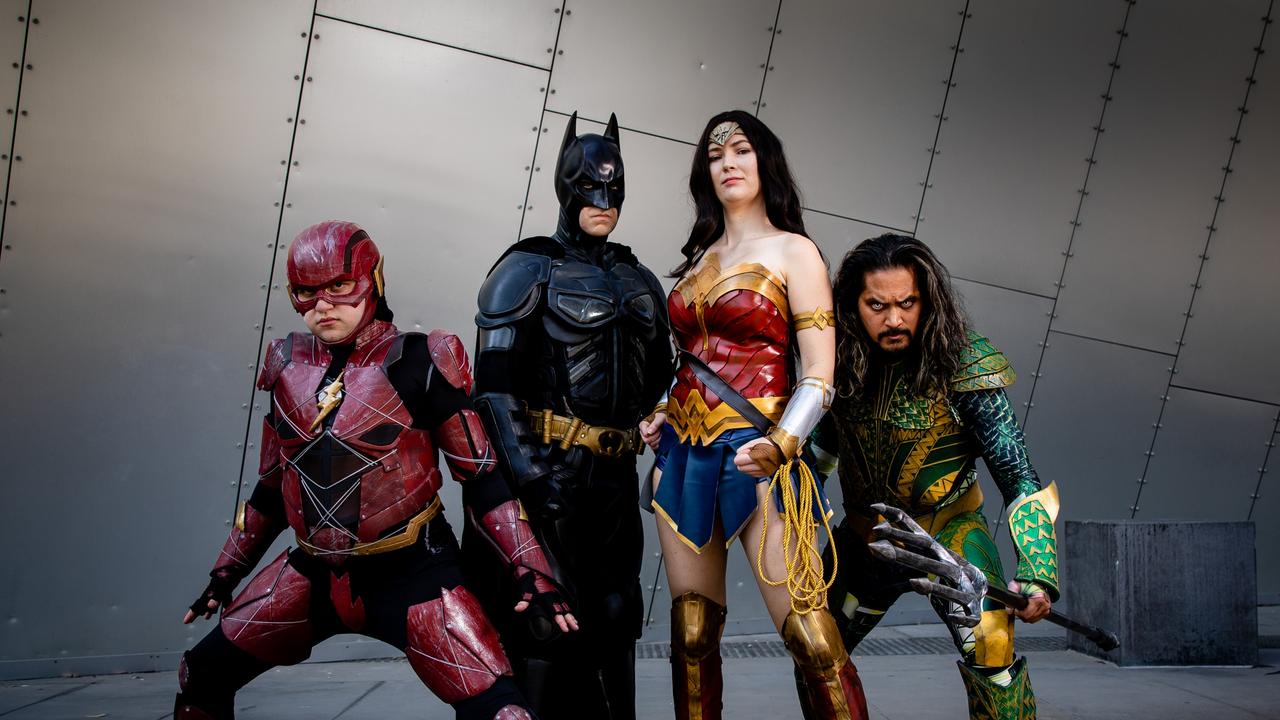 Superhero fans Dion Hechtman (The Flash), Paul Rizzo (Batman), Jacqui Sale (Wonder Woman) and Arwin Nidea (Aqua Man) ahead of yesterday’s Melbourne screening. Picture: Ben Weinstein Photography