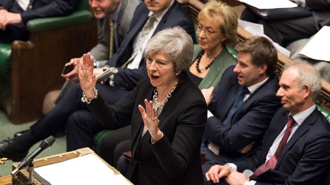 A handout photograph released by the UK Parliament shows Britain's Prime Minister Theresa May speaking to members of the House of Commons in London on January 29, 2019, as Parliament prepare to debate on amendments to her Brexit withdrawal bill. - British Prime Minister Theresa May urged MPs on Tuesday to give her a mandate to renegotiate her Brexit deal with the European Union, despite Brussels insisting it will not budge just two months before withdrawal day. (Photo by Mark DUFFY / UK PARLIAMENT / AFP) / RESTRICTED TO EDITORIAL USE - NO USE FOR ENTERTAINMENT, SATIRICAL, ADVERTISING PURPOSES - MANDATORY CREDIT " AFP PHOTO /MARK DUFFY / UK Parliament"