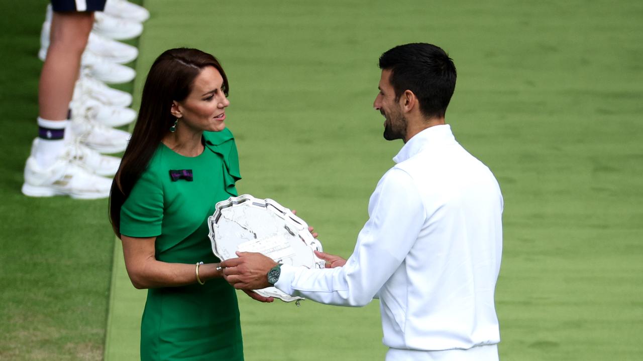 Novak Djokovic of Serbia receives the Men's Singles Runner's Up Trophy from Catherine, Princess of Wales following his defeat in the Men's Singles Final. Picture: Getty Images