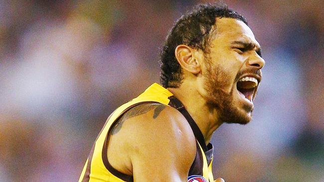 Cyril Rioli of the Hawks celebrates a goal during the round one AFL match between the Hawthorn Hawks and the Collingwood Magpies at Melbourne Cricket Ground on March 24, 2018 in Melbourne, Australia. (Photo by Michael Dodge/Getty Images)