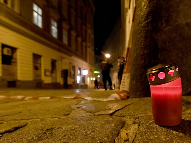 A candle has been left at the scene of an attack in Vienna, Austria. Picture: AFP