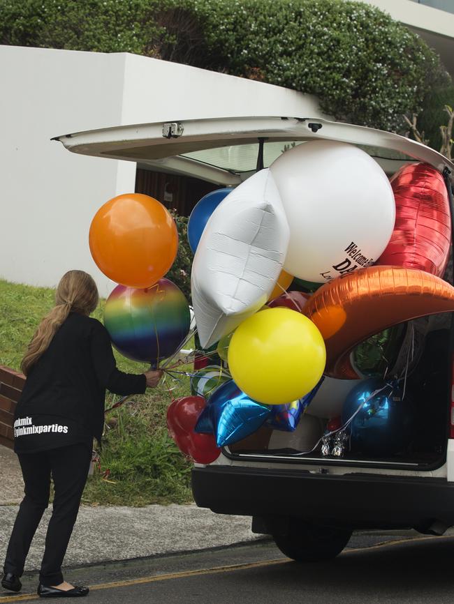 Balloons arrive at the residence. Picture: Jenny Evans