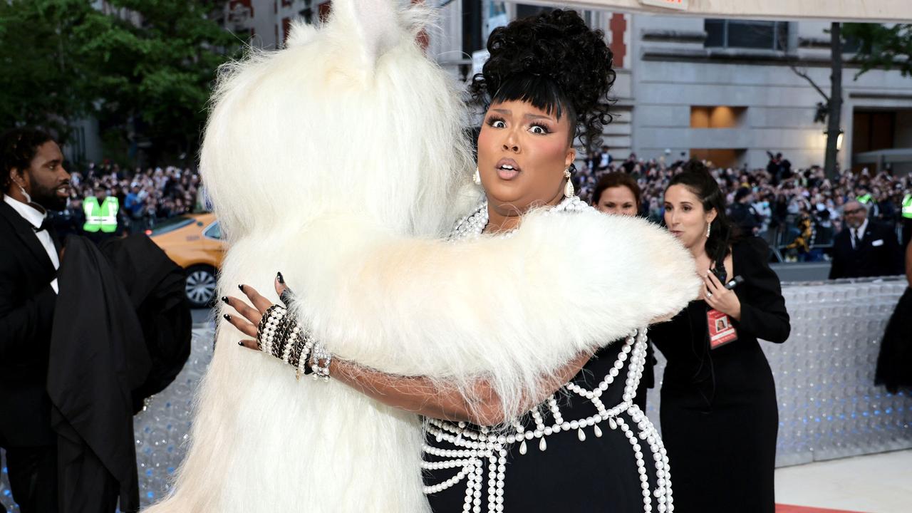 Lizzo was somewhat confused by the furry encounter. Picture: Jamie McCarthy/Getty Images/AFP.