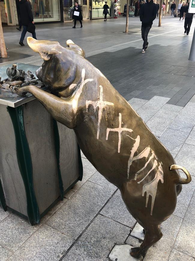 The pigs in Rundle Mall have been graffitied.