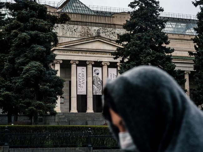 A woman passes the Pushkin State Museum of Fine Arts, which is temporarily closed due to the COVID-19, in downtown Moscow. Picture: AFP