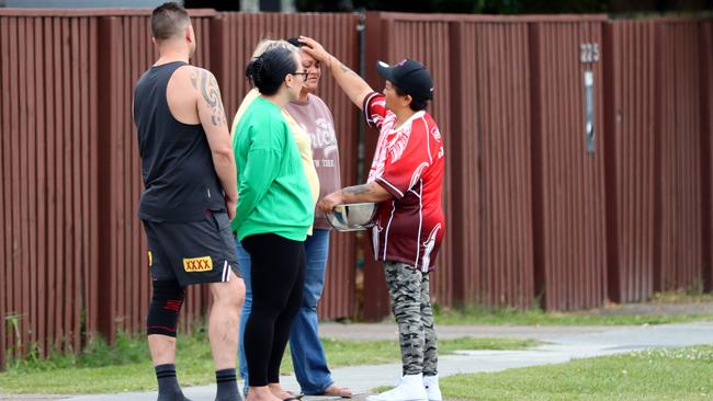 Locals at the scene of the crash. Picture: David Clark