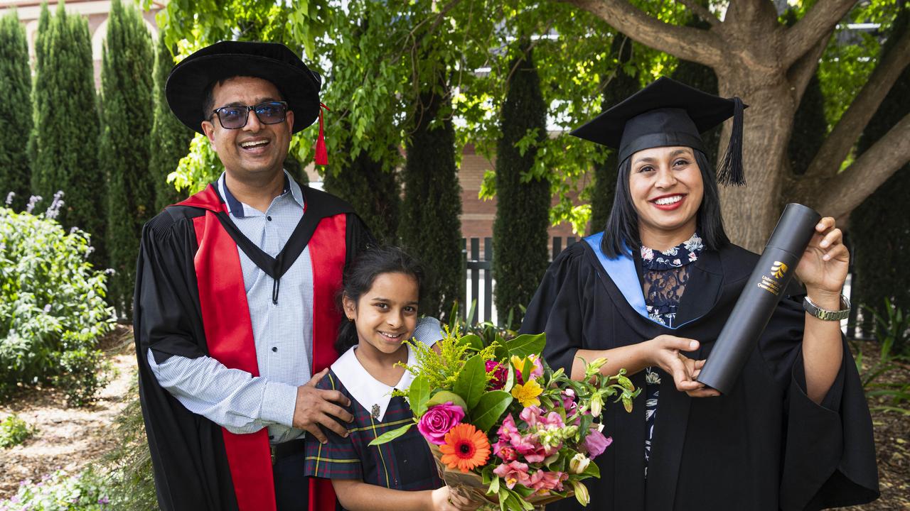 Bachelor of Medical Laboratory Science graduate and Valedictorian Pinkey Timilsina with Prajwal Gyawali of UniSQ's School of Health and Medicine and their daughter Anaya Gyawali at a UniSQ graduation ceremony at The Empire, Tuesday, October 29, 2024. Picture: Kevin Farmer