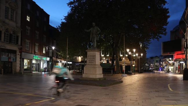 A picture shows an empty street in the centre of Cardiff on October 23. Picture: AFP