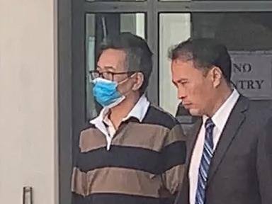 Pictured is Hue Quyen Tang (in stripped top) entering and leaving Campbelltown Court on Monday morning., Two men have fronted court after they were allegedly involved in an operation that swindled 250 tonnes of salmon from their boss at Huon Aquaculture Ingleburn plant in Sydney's south-west. , Picture taken by Lauren Ferri, ID Confirmed by journalist Lauren Ferri who is at court