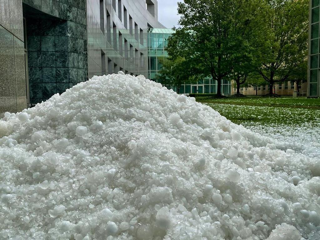 Hail seen piled up outside Parliament House. Picture: Instagram