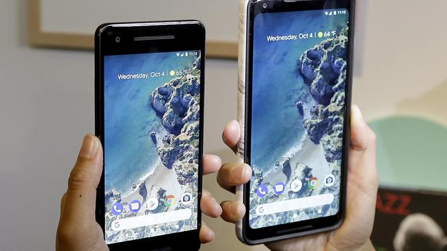 The Google Pixel 2 phone, left, next to the Pixel 2 XL phone at the Google event this morning. Picture: Jeff Chiu