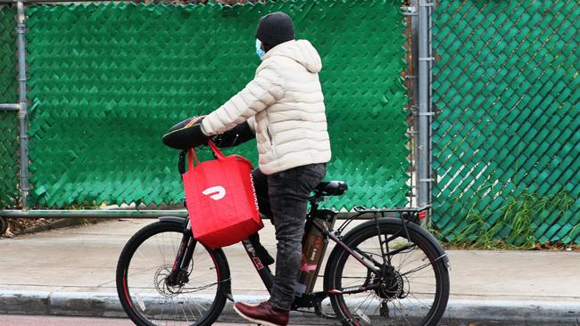 Food delivery business DoorDash has cut as many 1250 roles from its corporate side. Picture: Getty Images