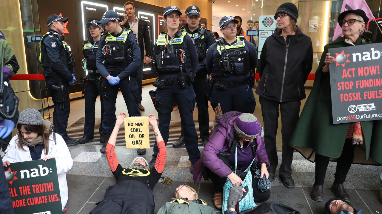 Climate protesters are holding three days of protest in Melbourne. Pictured in front of NAB headquarters in Bourke St. Picture: NCA NewsWire / David Crosling