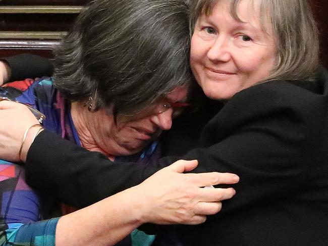 MELBOURNE, AUSTRALIA - NOVEMBER 22:  Colleen Hartland MP is congratulated as the bill passes inside of the Parliament of Victoria on November 22, 2017 in Melbourne, Australia. Government MPs believe they will pass Victoria's controversial assisted-dying bill which would give terminally-ill Victorians in intolerable pain and with less than six months to live the right to ask to end their lives using prescription medication. Victoria's lower house passed the historic voluntary euthanasia laws on Friday 20 October after 26 hours of debate. Victoria will be the first state in Australia to offer an assisted dying regime if the legislation is passed by the upper house.  (Photo by Scott Barbour/Getty Images)