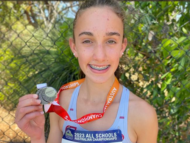 Violet Owen with her silver medal. Picture: Athletics Tasmania