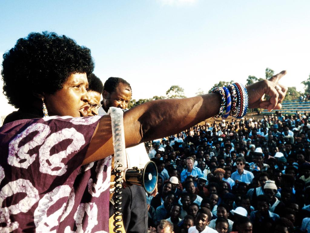 Former Soweto resident, the late Winnie Mandela, addresses a township meeting in 1986 while husband Nelson Mandela is in prison. Picture: AFP/Gideon Mendel