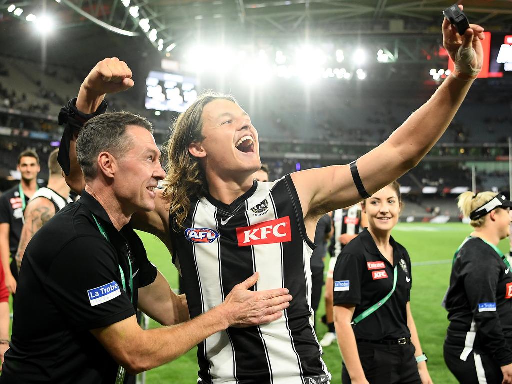 Aa selfie to mark the coach’s first win with Craig McRae and Jack Ginnivan. Picture: Getty Images