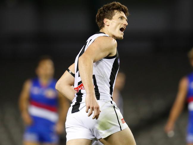 Brody Mihocek celebrates a goal against the Western Bulldogs. Picture: MICHAEL WILLSON/AFL PHOTOS VIA GETTY IMAGES