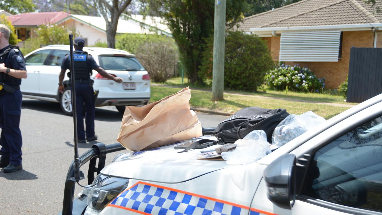 The material was loaded into police evidence bags.