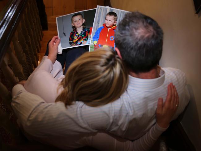 William Tyrrell's foster parents looking at pictures of their missing son.