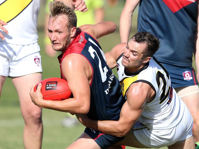 Matthew Green (left) pictured playing against Labrador. Photo by Richard Gosling