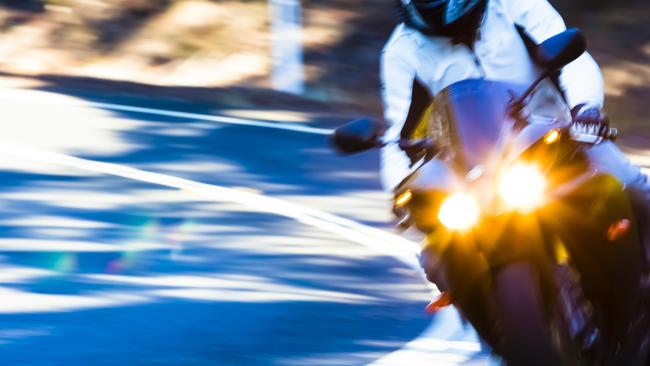 Speed, riding motorcycle on the highway, background with copy space