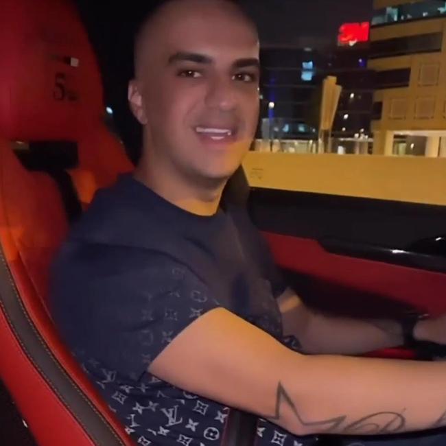 YOUNG Melbourne gangland figure Ahmed Al-Hamza smiling at the wheel of a luxury Lamborghini sports car in Dubai. Picture: Supplied