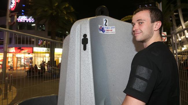 Dylan McCartney, uses the open-air-urinal on Caville Avenue, Surfers Paradise, Gold Coast.