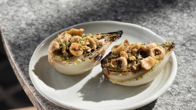 Roasted onions with miso and hazelnuts Picture: Duy Dash