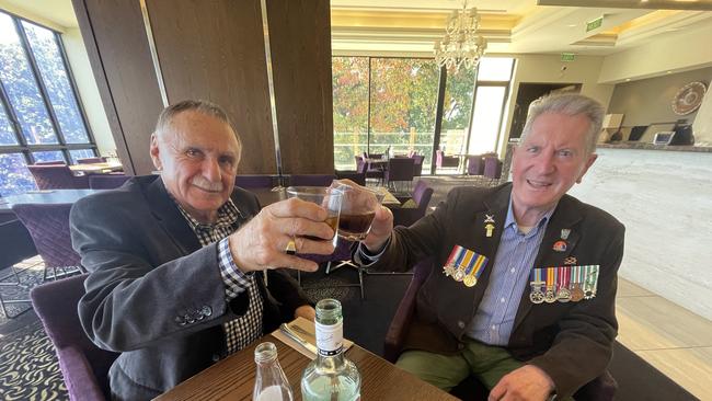 Box Hill sub-branch president sub-branch president John Haward and secretary Andrew Guest share a Bacardi and Coke in a flashback to John's 21st birthday while serving as a trooper in the Vietnam War.