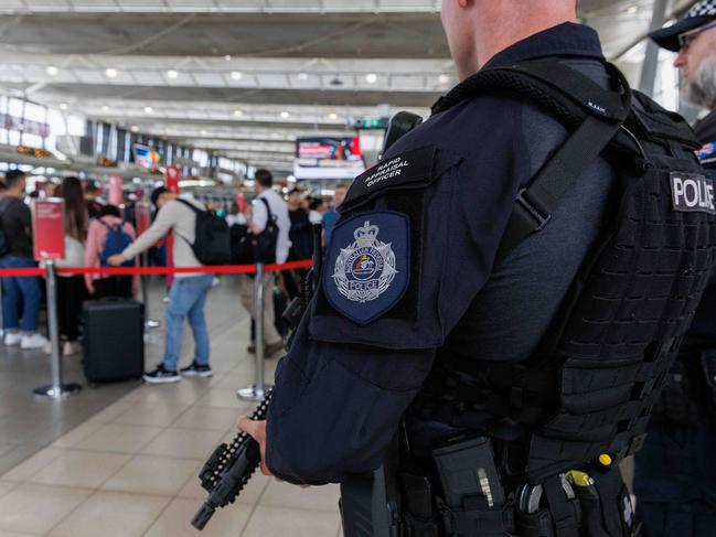 Australian Federal Police officers on duty at Sydney Airport. Picture: NCA NewsWire/David Swift