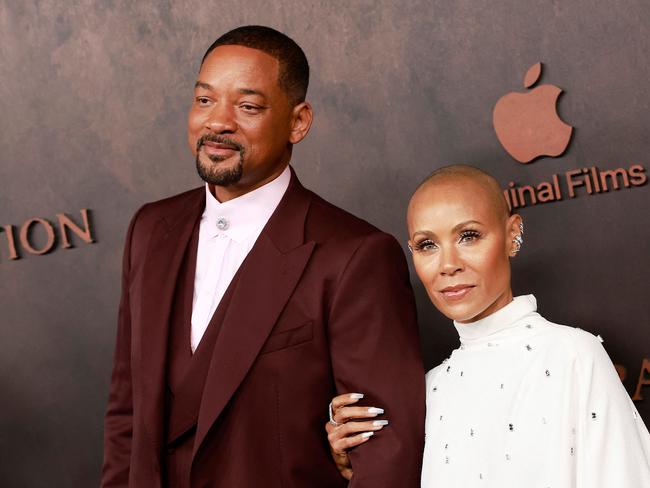 US actor Will Smith and his wife actress Jada Pinkett Smith arrive for the premiere of Apple Original Films' "Emancipation" at the Regency Village Theatre in Westwood, California, on November 30, 2022. (Photo by Michael Tran / AFP)