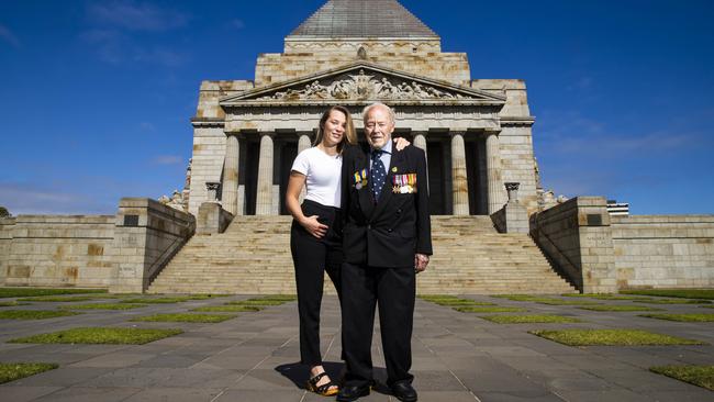 World War II navy veteran Nevin Phillips, 96, with his granddaughter Lauren, 25, at the Shrine of Remembrance in Melbourne. Picture: Aaron Francis