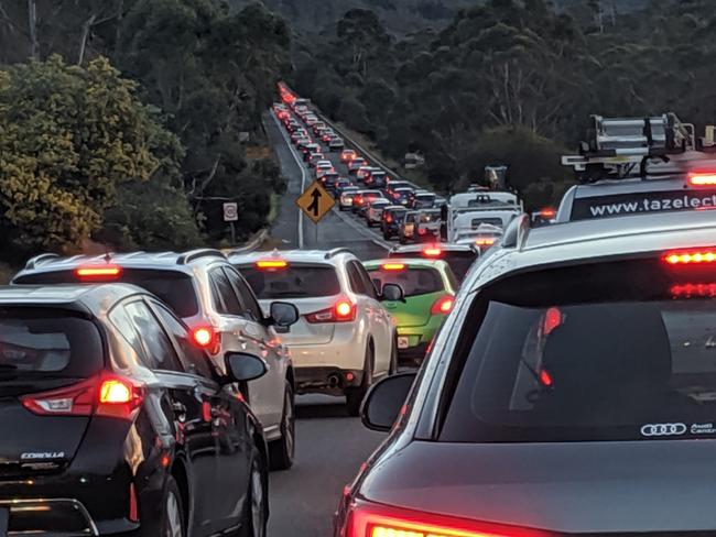 Commuters grind to a halt on Southern Outlet after a crash blocks traffic. Picture: DAVID KILLICK