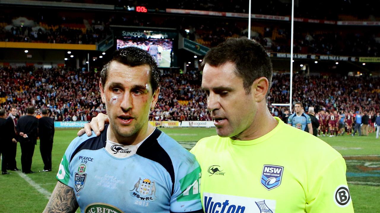 Mitchell Pearce walks off with Brad Fittler after State of Origin 2 Queensland v NSW at Suncorp Stadium, Brisbane.