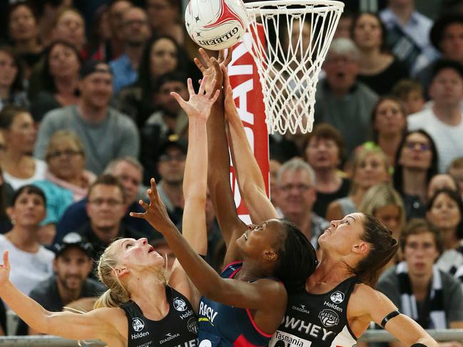 Super netball season - Melbourne Vixens v Collingwood Magpies at Hisense Arena, 18th February, Melbourne Australia. Vixens Mwai Kumwenda battles for the ball against magpies April Brandley and Sharni Layton. Picture : George Salpigtidis