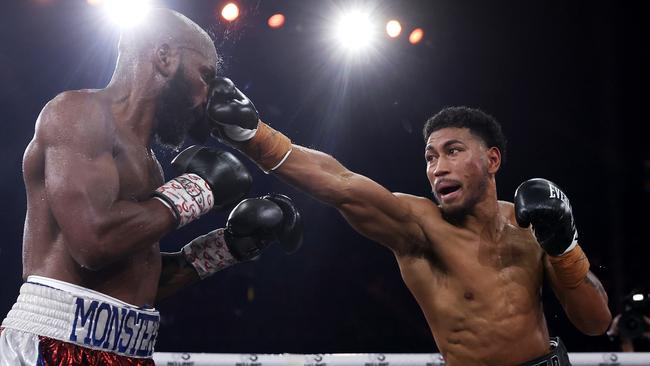 Yunieski Gonzalez (l) is punched by Paulo Aokuso during the light heavyweight bout on March 12, 2023 in Sydney, Australia. (Photo by Mark Kolbe/Getty Images)