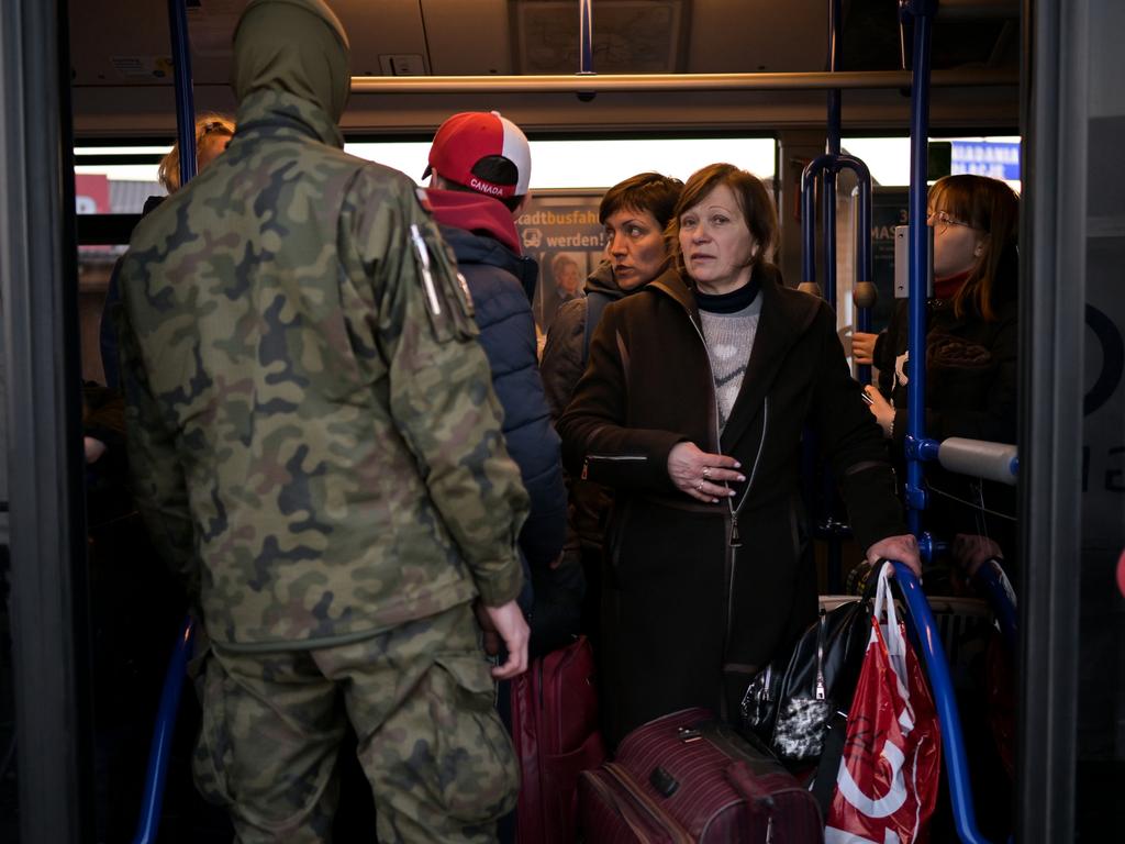 Refugees pass through the Medyka border crossing in Poland. Picture: Jeff J Mitchell/Getty Images