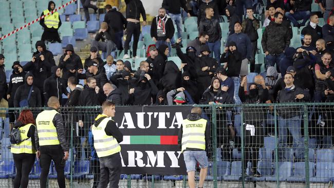 A group of black-clad Bulgarian fans were ejected from the Vasil Levksi national stadium after England players were subjected to racist taunts. Picture: AP