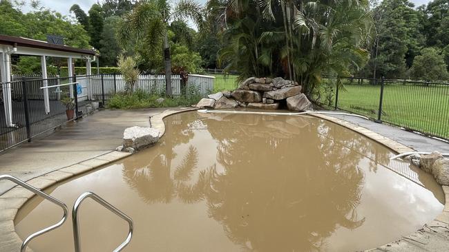 A pool that was inundated by floodwaters at Samford. Picture: Iwan Jones