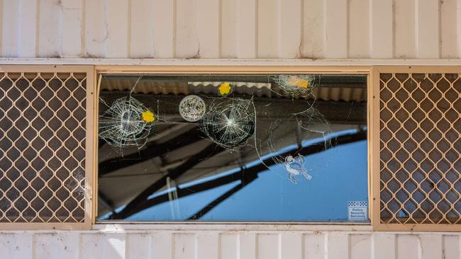 Damage to Happy Valley Primary School windows, which were smashed with hundreds of golf balls. Picture: Ben Clark