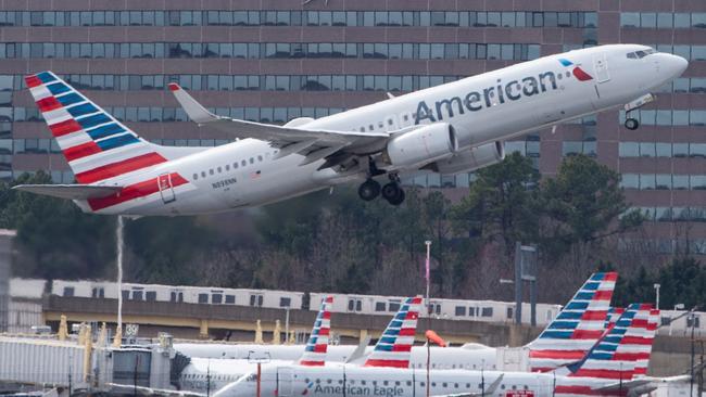 A Boeing 737 flown by American Airlines takes off from Ronald Reagan Washington National Airport in Arlington, Virginia.