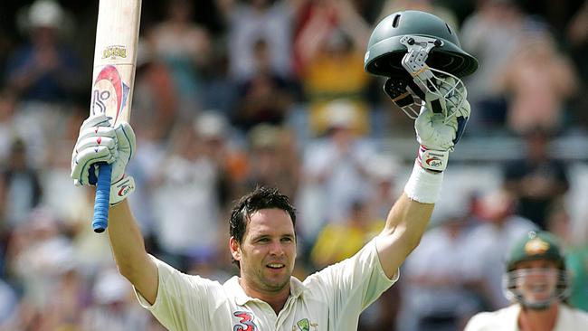 Brad Hodge celebrates his maiden Test ton.