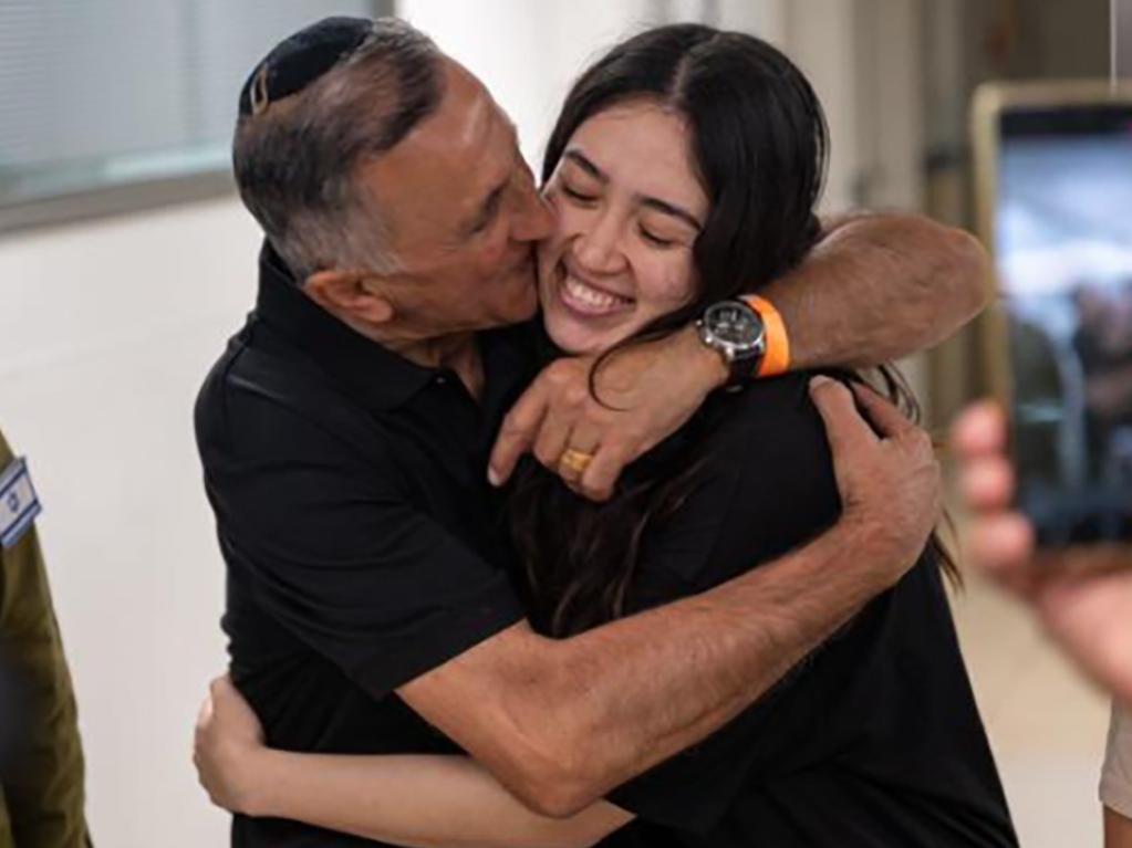 Israeli hostage Noa Argamani, 26, embraces a family member at the Sheba Tel-HaShomer Medical Centre after her rescue from the Gaza Strip on Saturday. Picture: Supplied