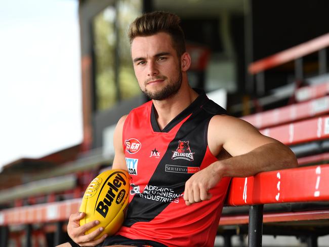 Will Snelling poses for a photograph at West Adelaide football club, Richmond, Adelaide on Saturday the 1st of December 2018. Will has returned to West Adelaide - his junior SANFL club - after being delisted by the Power last month and not selected at the AFL drafts.  (AAP/ Keryn Stevens)