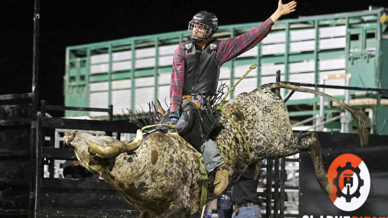 Shane Dyer competes in the Great Northern Bull riding series bull ride event at the Mossman Showgrounds. Picture: Stephen Harman