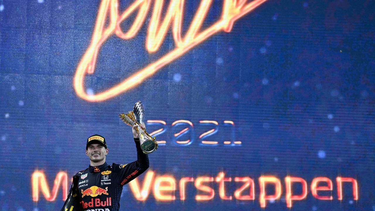 Max Verstappen celebrates on the podium of the Yas Marina Circuit after the Abu Dhabi Formula One Grand Prix. Picture: AFP
