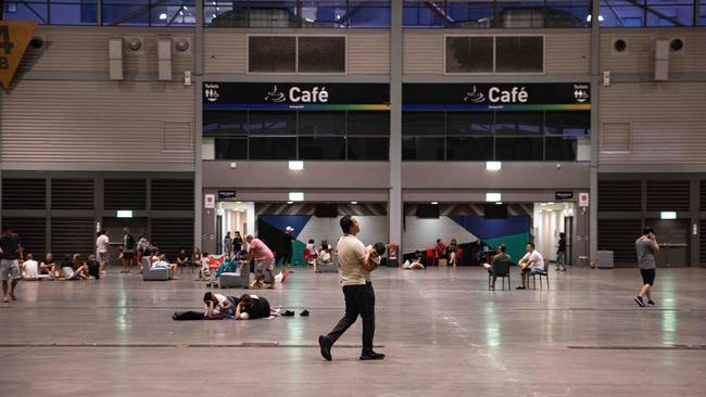 Evacuees inside a Sydney showground exhibition hall. Picture: Flavio Brancaleone