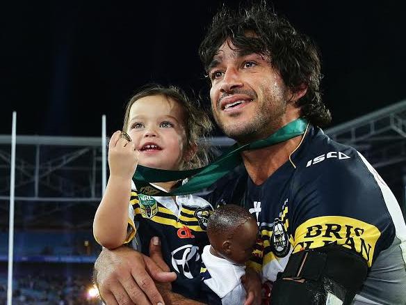 Daily Telegraph photographer, Brett Costellos entriy in teh Kennedy Awards, "Johnathan Thurston" is a series of five pictures documenting the North Queensland Cowboys NRL captain Johnathan Thurston winning the 2015 NRL Premiership.  Cowboy's Johnathan Thurston and his daughter Frankie after the Cowboys won the 2015 NRL Grand Final between the Brisbane Broncos and North Queensland Cowboys at ANZ Stadium, Sydney. Pic Brett Costello