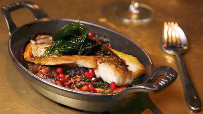 A fillet of snapper with spiced eggplant pimped with pomegranate. Picture: Jane Dempster